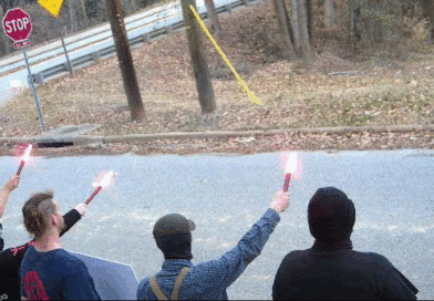 In this screenshot, camera footage shows a group of alleged neo-Nazis outside the home of Raw Story investigative reporter Jordan Green.